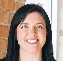 Portræt af Sophie Hartwell, kundesupportchef i serviceteamet